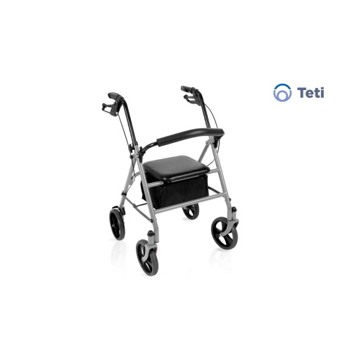 Rollator pieghevole TETI in acciaio verniciato colore argento. 4 ruote PU Ø 20 cm, freno stazionamento, maniglie regolabili 80-90 cm. Seduta imbottita, schienale ribaltabile, busta portaoggetti. Portata 136 kg, peso 9 kg.